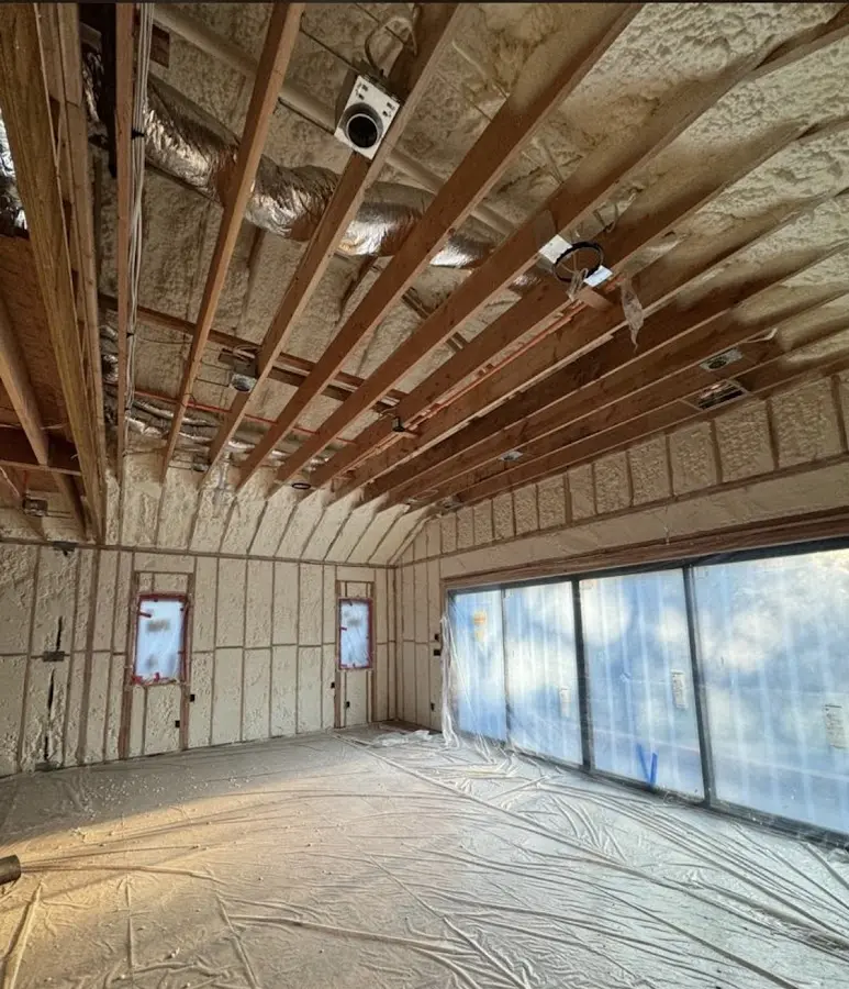 Interior walls and ceiling insulated with spray foam during new construction in Tisbury